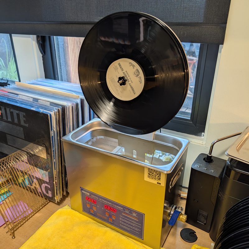 An LP lifted out of the VEVOR 6L ultrasonic tank